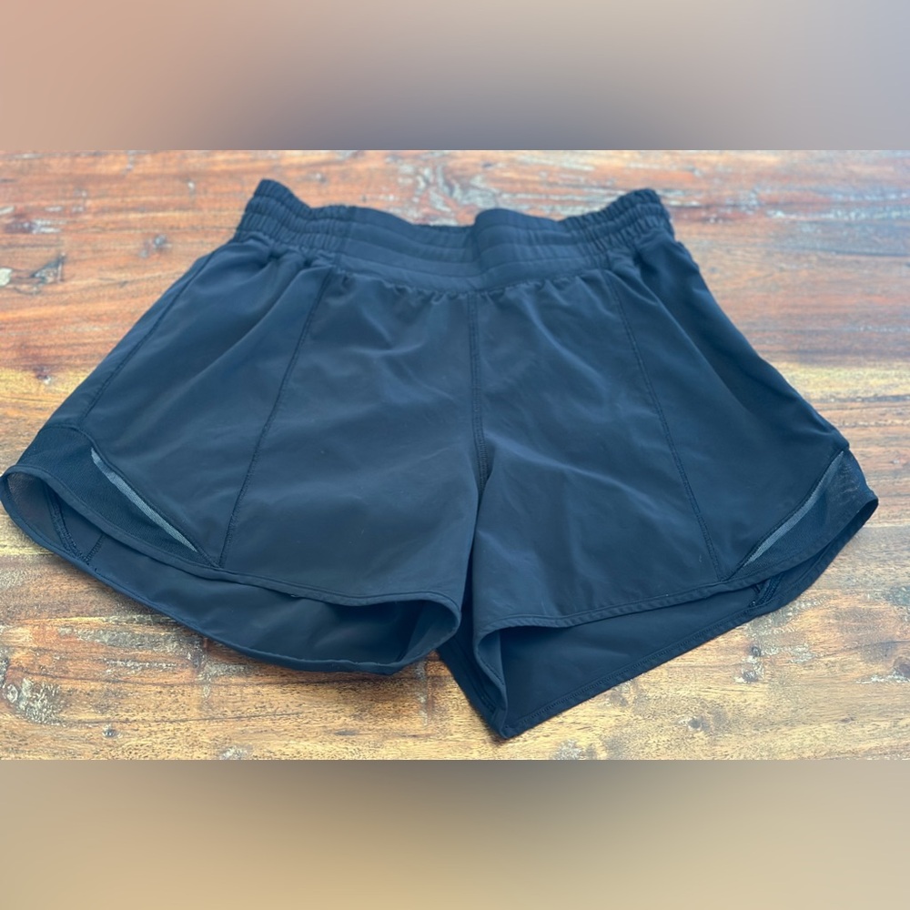 Lululemon Hotty Hot 4” black shorts. Size 4 tall. Like new.